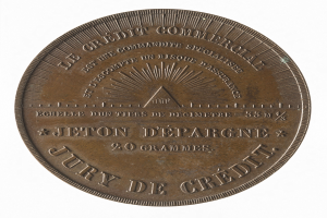 Bronze-Medaille mit der Aufschrift 'Jury de Credit' auf weißem Hintergrund.