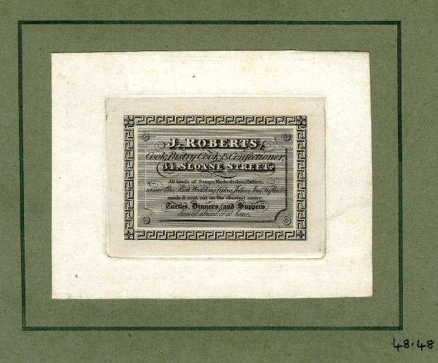 Fotorahmen mit einem Blatt Papier, auf dem "J.R. Roberts, Inc." steht und eine Aktiennummer.