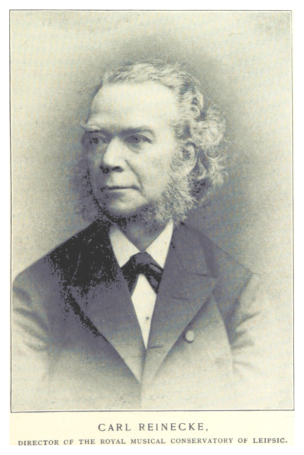 Schwarzes und weißes Foto von Carl Reinecke, dem Direktor des Königlichen Musik-Konservatoriums von Leipzig, der einen Anzug trägt, mit Text am unteren Bildrand.