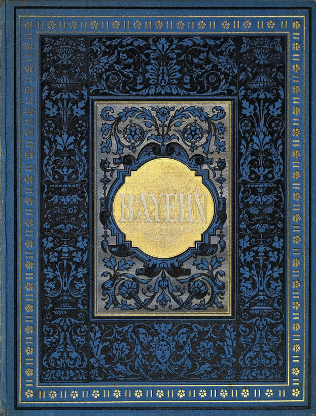 Ein blau-goldenes Buch mit der Aufschrift 'Bayern' auf dem Cover, das mit detaillierten Dekorationen verziert ist.