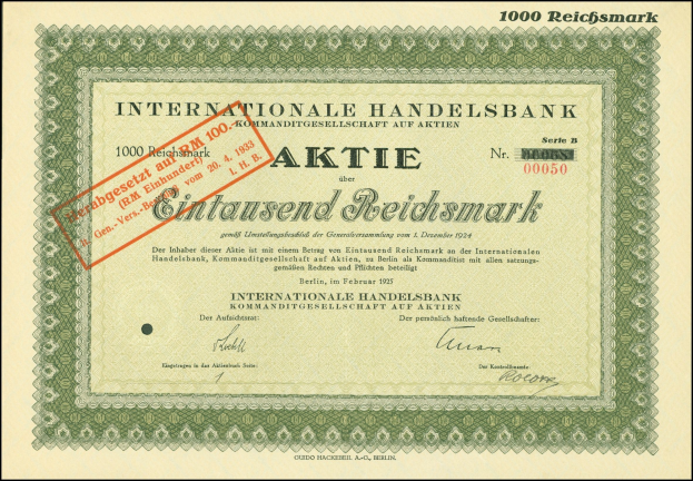 Rahmengestellter internationaler Aktienzertifikat mit rotem Stempel und aufgedrucktem Nennwerttext.